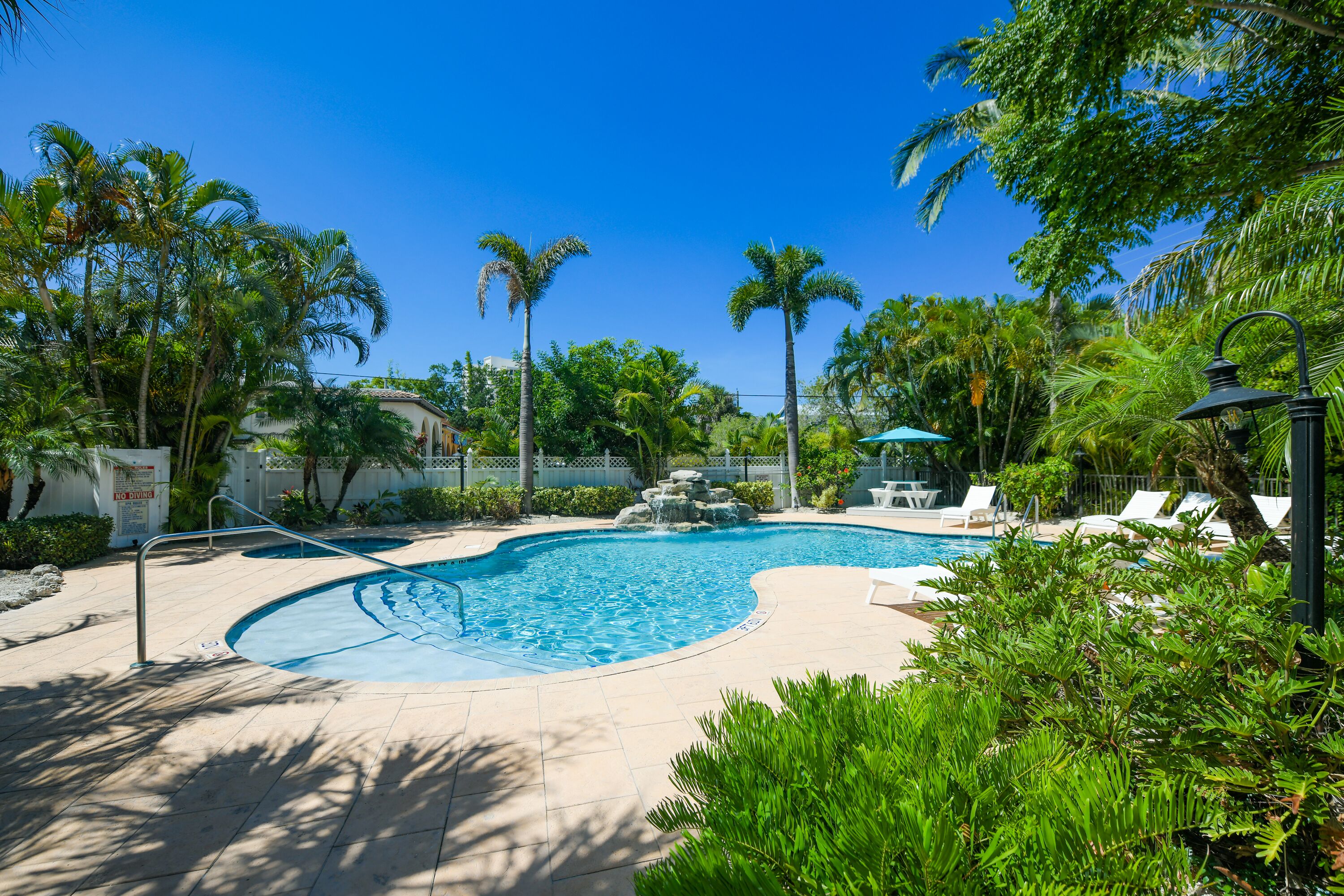 2 outdoor pools, pool umbrellas, pool loungers