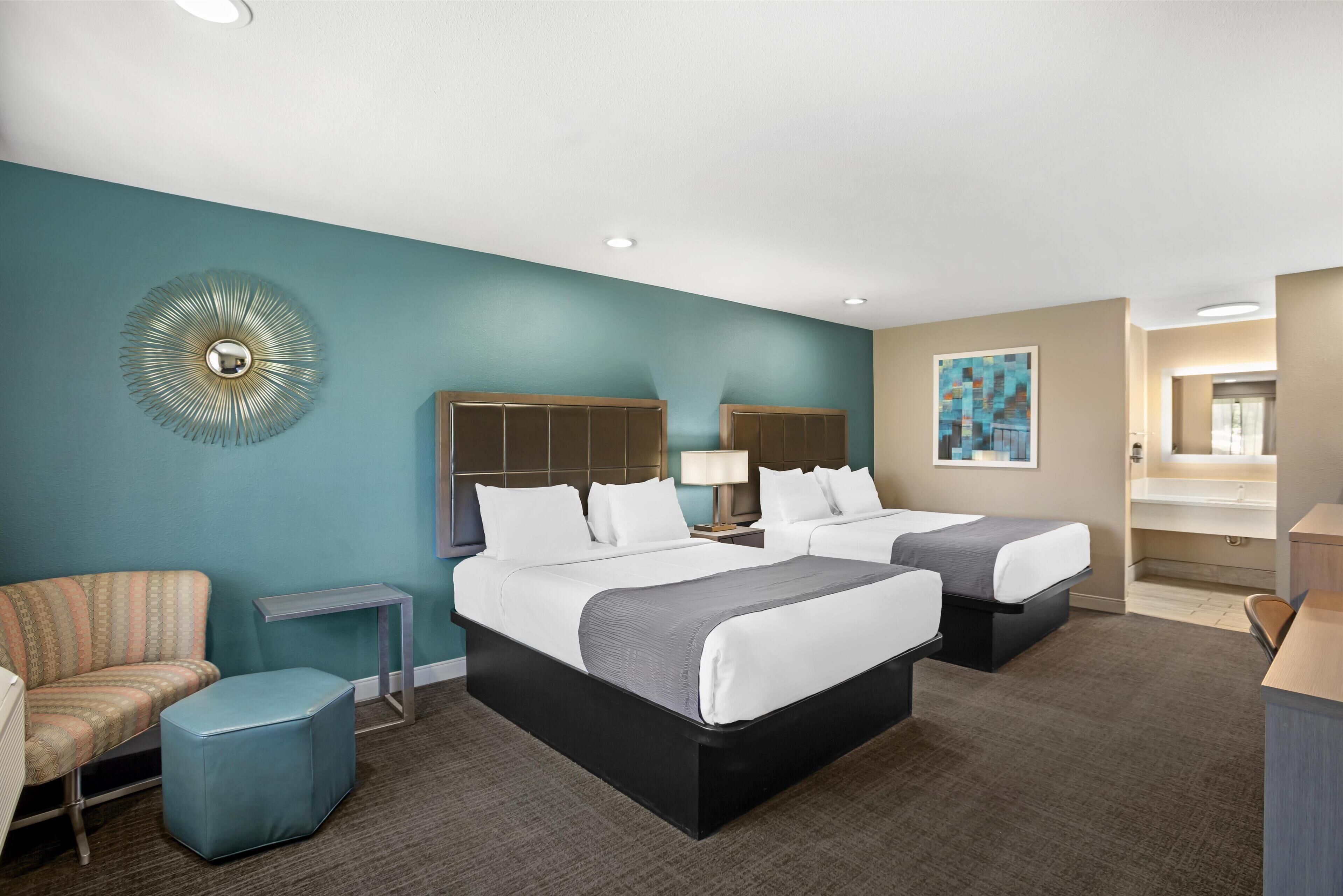 standard room, 2 queen beds, non smoking, microwave | 1 bedroom, down duvets, pillow-top beds, in-room safe