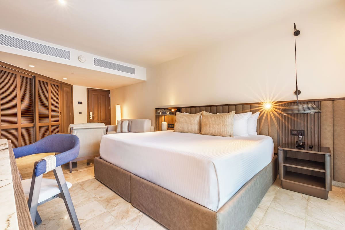 Premium bedding, pillow-top beds, free minibar, in-room safe