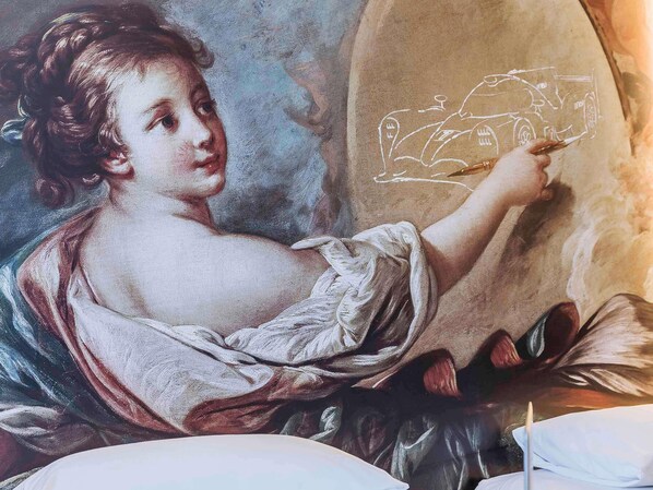 A classical painting with a figure holding a drawing of a carriage. - ibis Styles Le Mans Centre Gare (Le Mans)