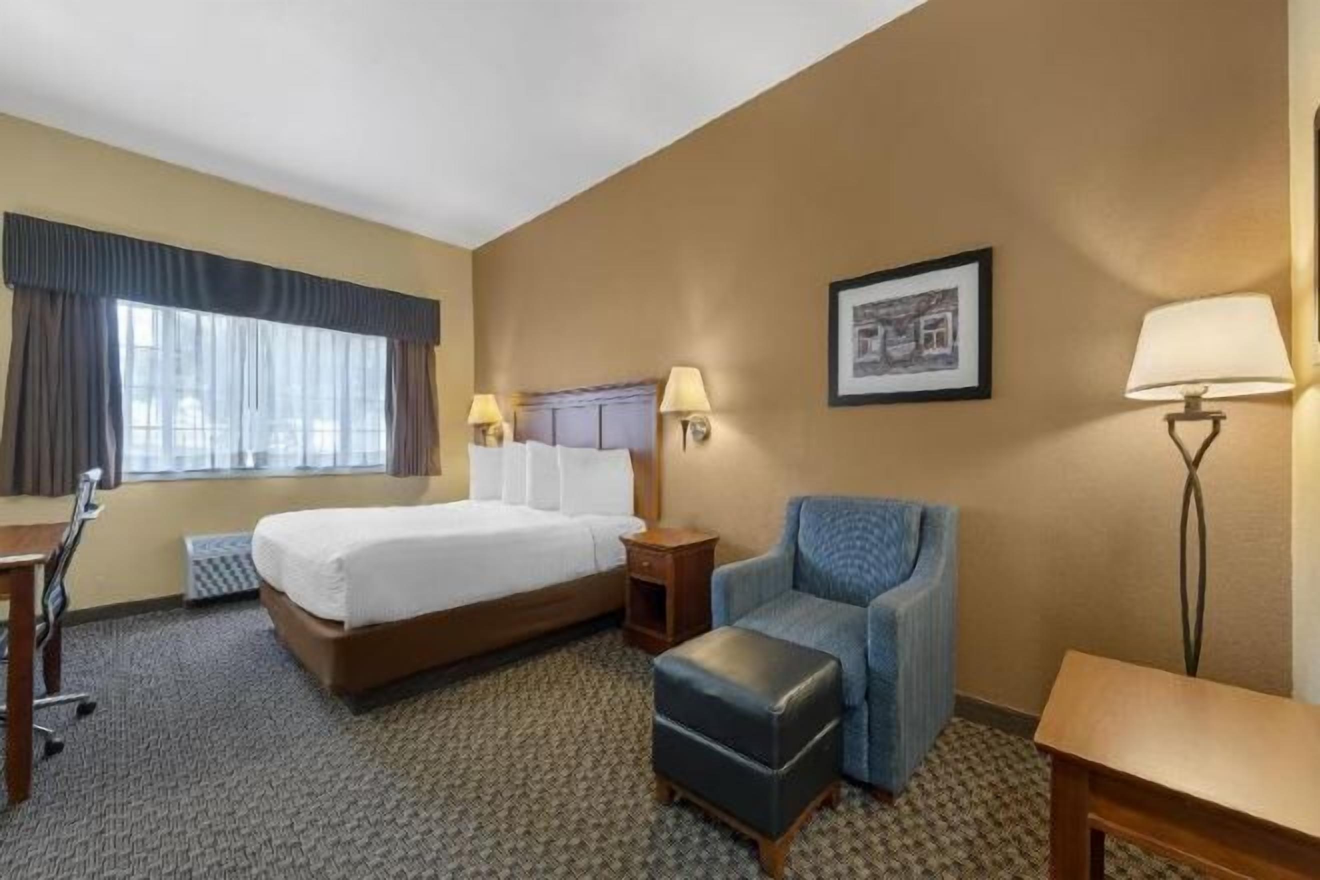 Desk, laptop workspace, iron/ironing board, cribs/infant beds