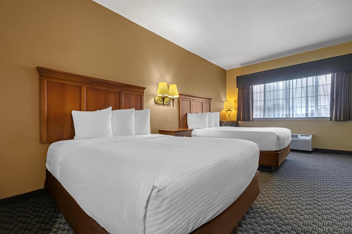 Desk, laptop workspace, iron/ironing board, cribs/infant beds