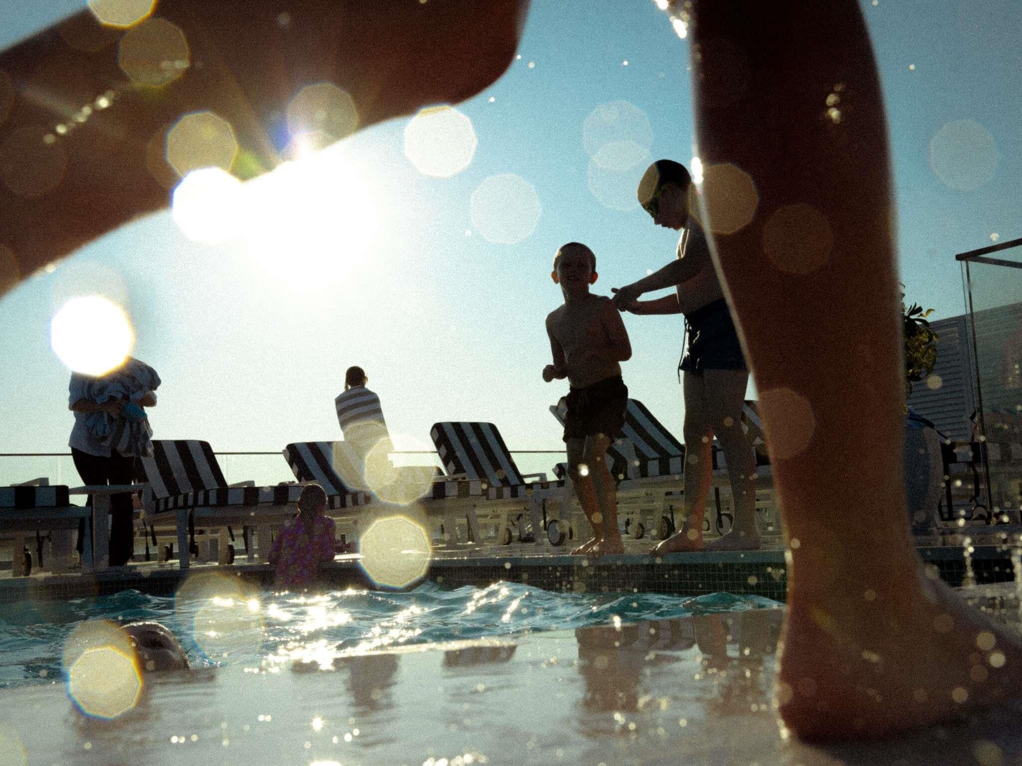 Outdoor pool, open 9:30 AM to 7:30 PM, pool umbrellas, sun loungers