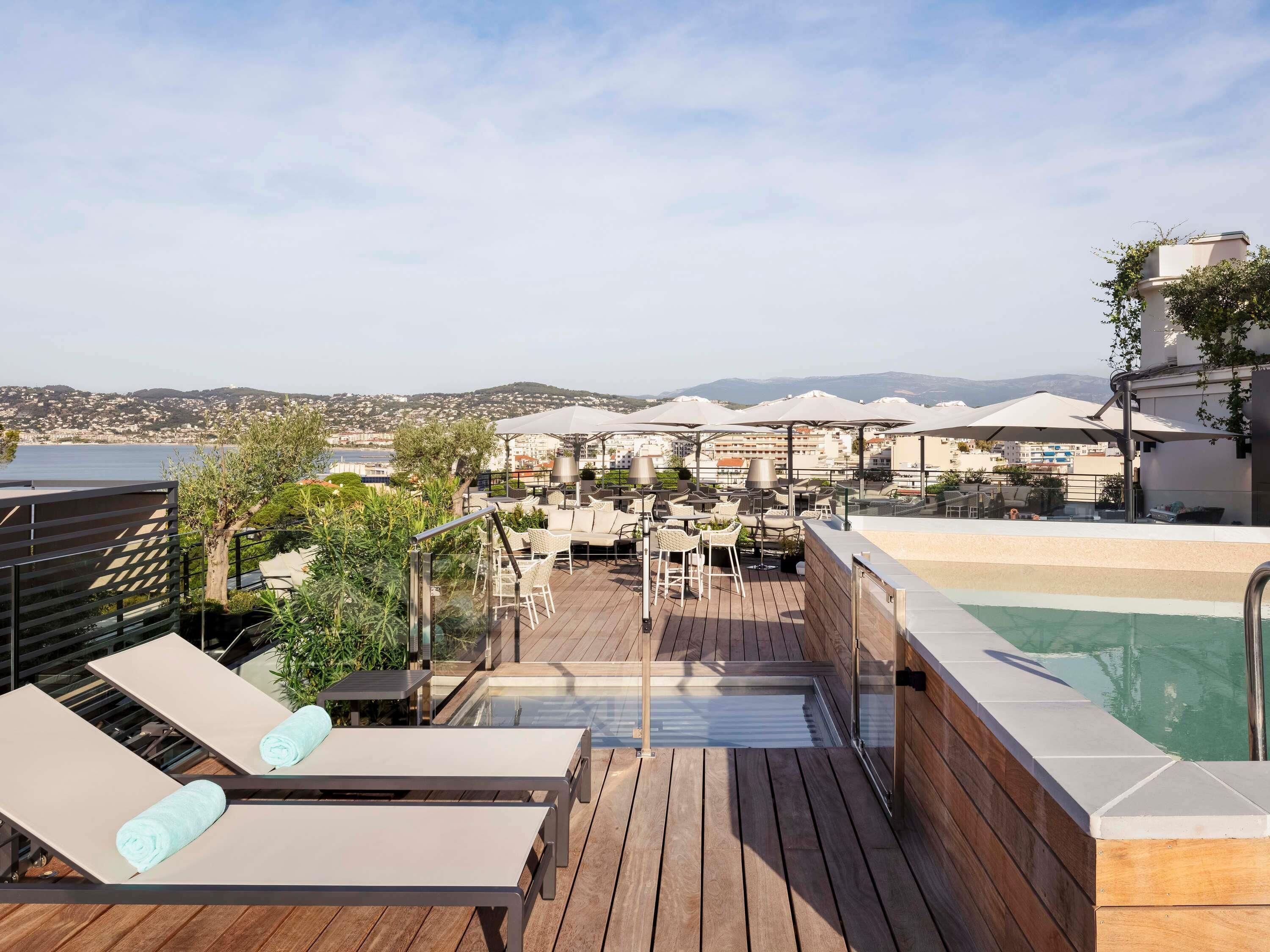 Outdoor pool, open 9:30 AM to 7:30 PM, pool umbrellas, sun loungers