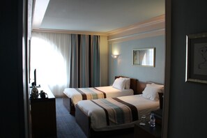 Traditional Twin Room, 2 Single Beds (Tradition) | 1 bedroom, minibar, in-room safe, individually decorated