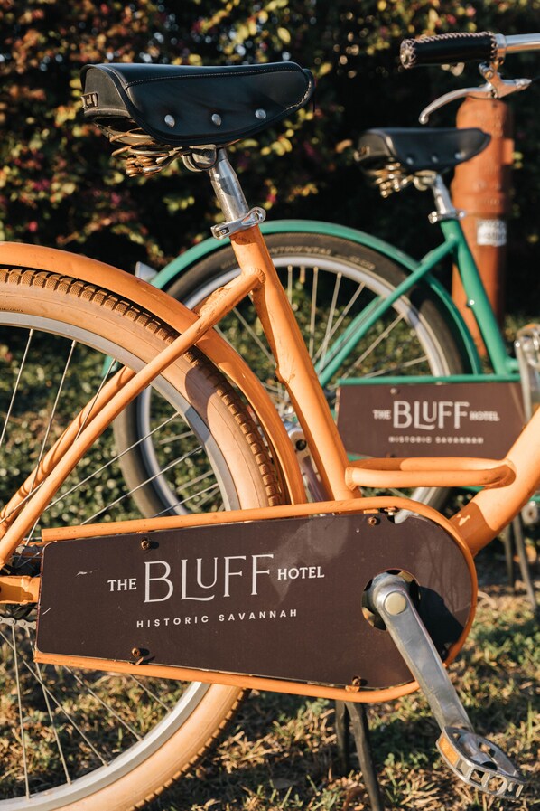 A bicycle with a sign that reads "The Bluff Hotel Historic Savannah." - The Bluff Savannah Historic District, Tapestry by Hilton (Savannah)