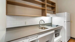 Studio, 1 Queen Bed, Non Smoking | Private kitchen | Coffee/tea maker, full-sized fridge, microwave, stovetop