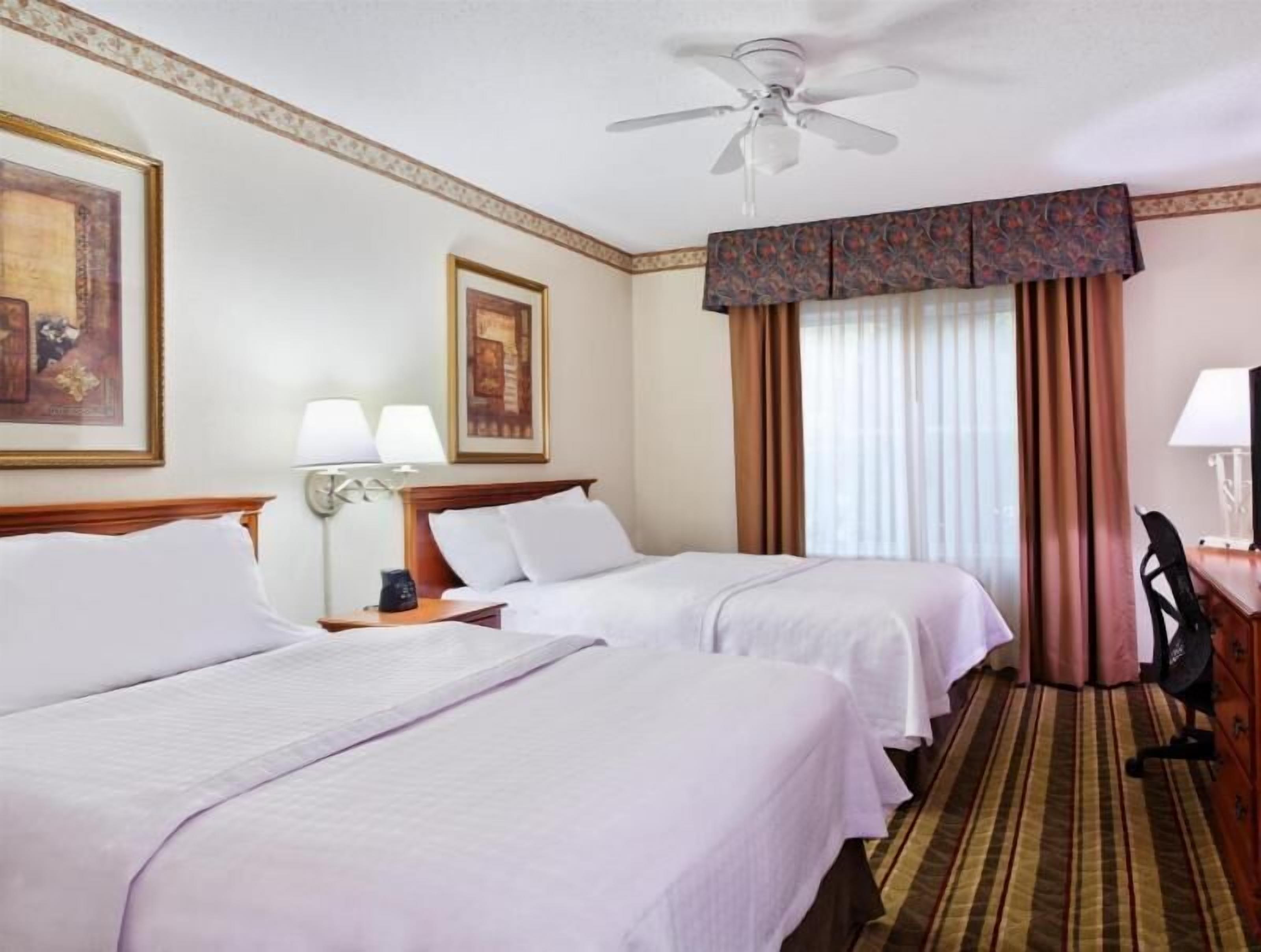 Premium bedding, down duvets, desk, laptop workspace