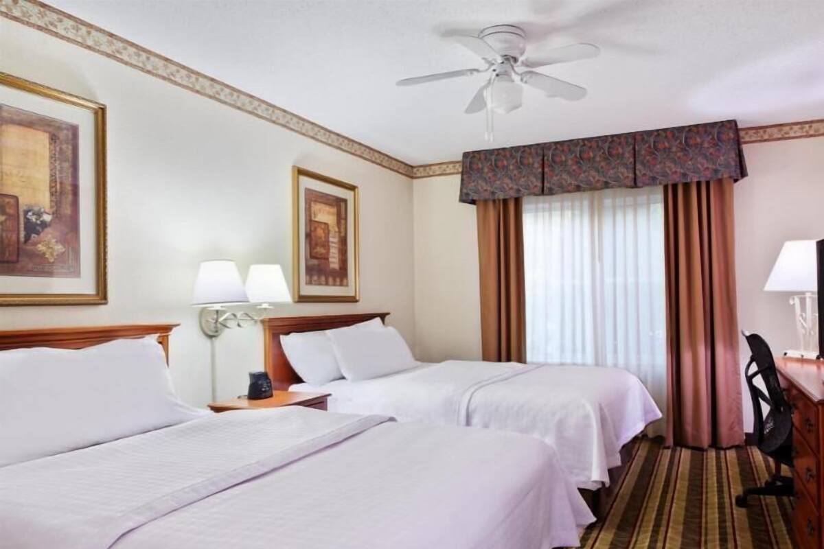 Premium bedding, down duvets, desk, laptop workspace