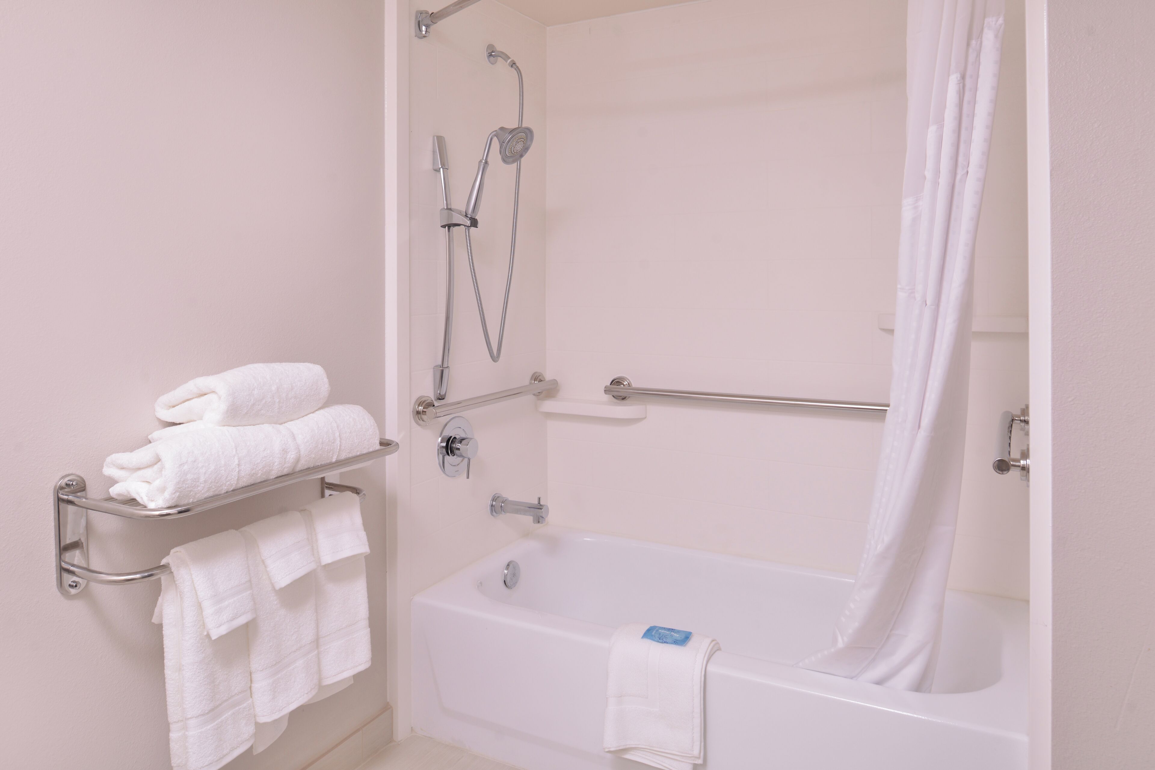 combined shower/bathtub, free toiletries, hair dryer, towels