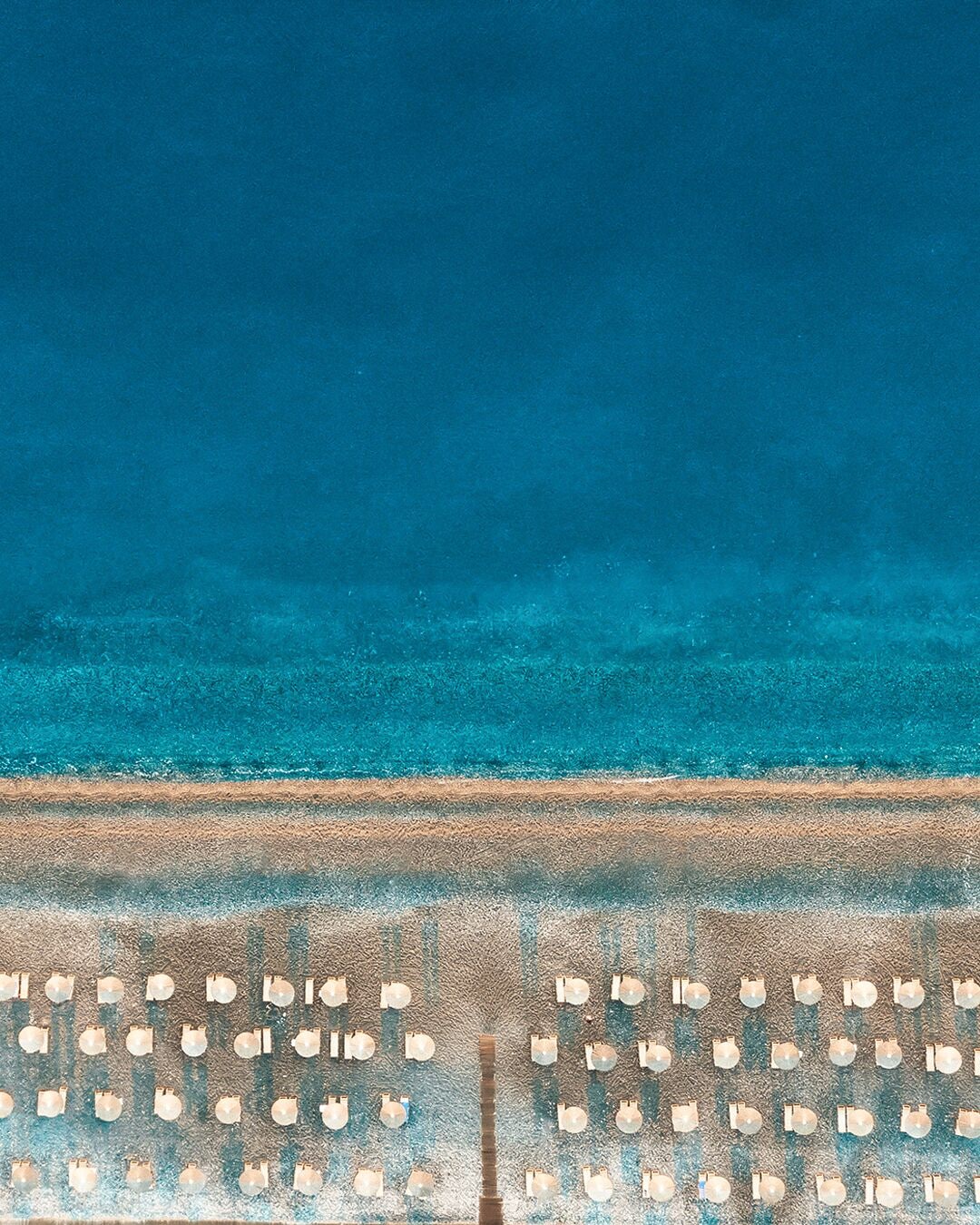 private beach, free beach shuttle, sun-loungers, beach umbrellas