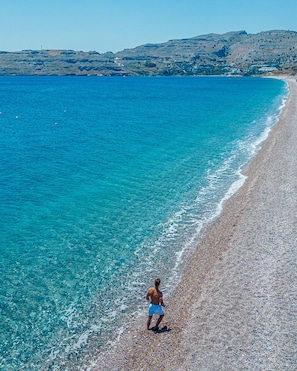 Private beach, free beach shuttle, sun-loungers, beach umbrellas