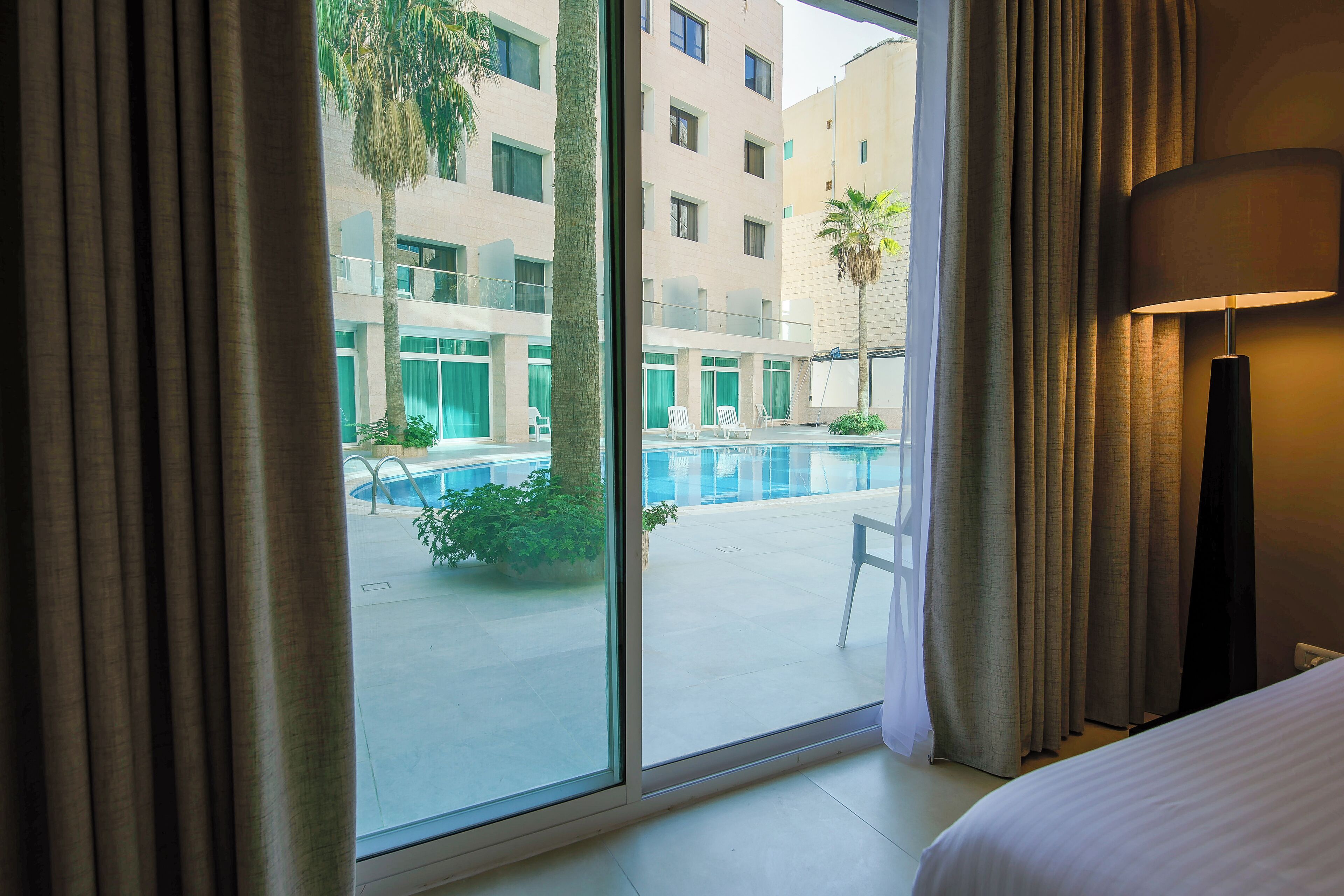 Superior Double or Twin Room, Pool Access | Minibar, in-room safe, free WiFi, bed sheets