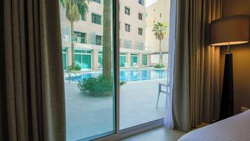 Superior Double or Twin Room, Pool Access | Minibar, in-room safe, free WiFi, bed sheets