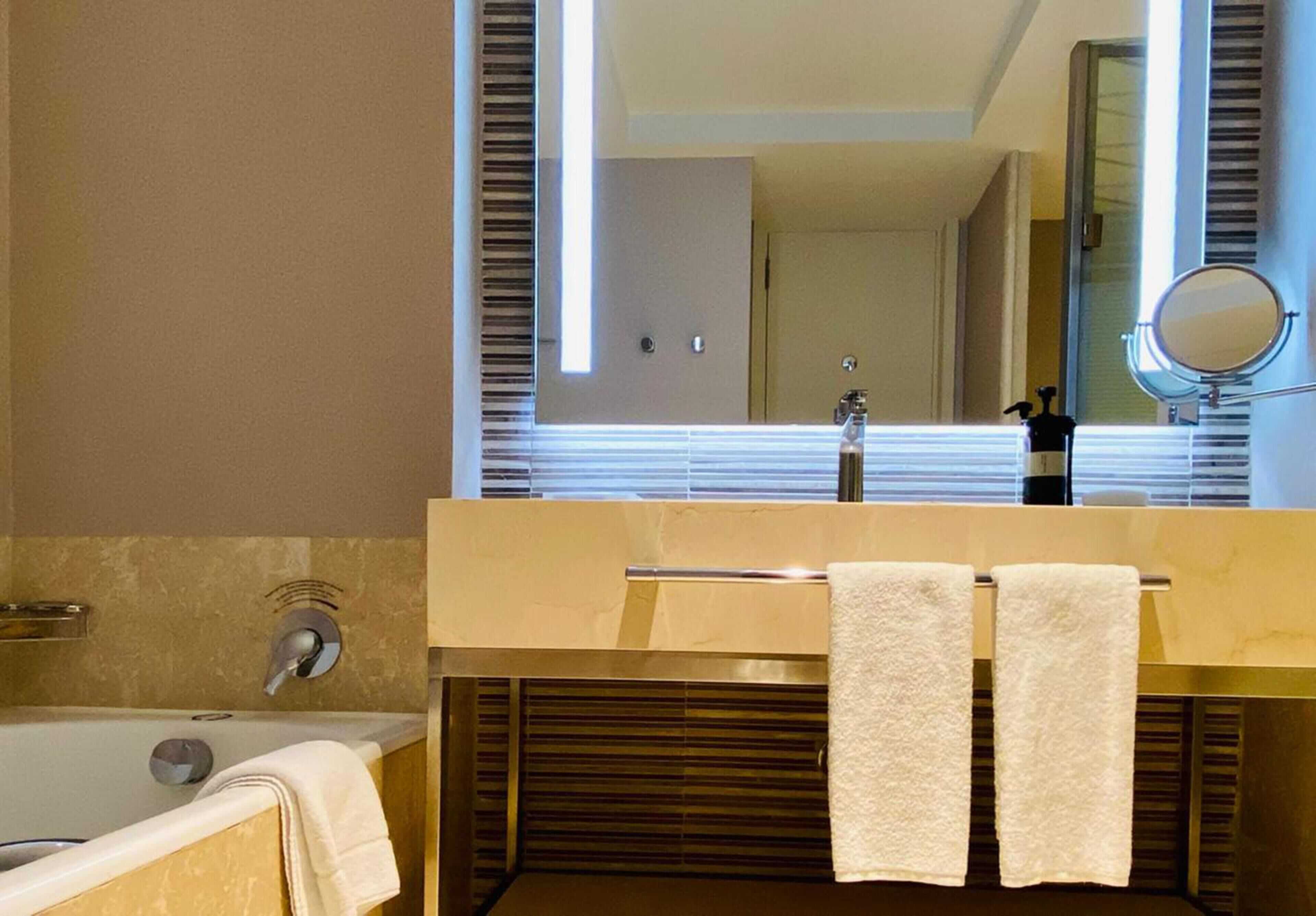 Separate bathtub and shower, free toiletries, hair dryer, towels