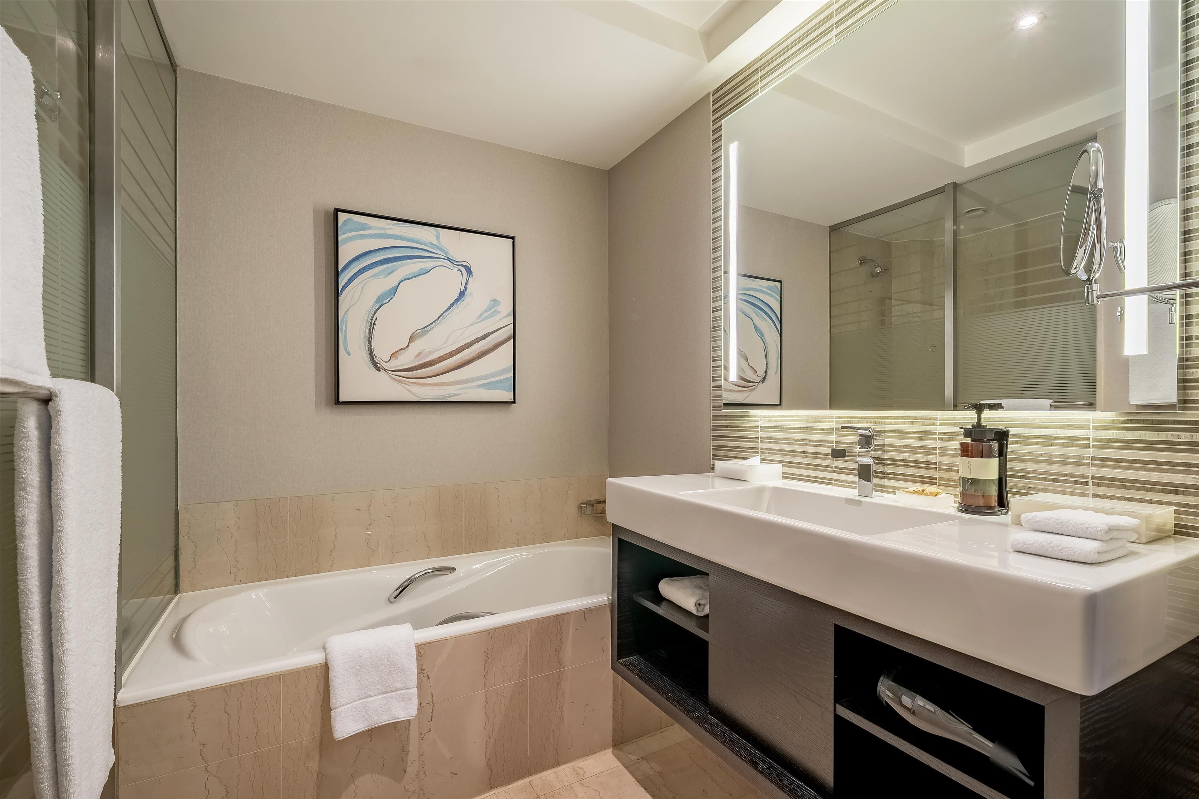 separate bathtub and shower, free toiletries, hair dryer, towels