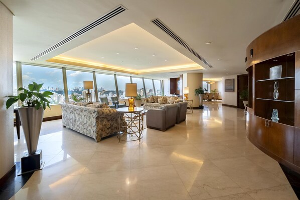 Suite, Club Lounge Access | Living area | 42-inch LCD TV with cable channels, TV