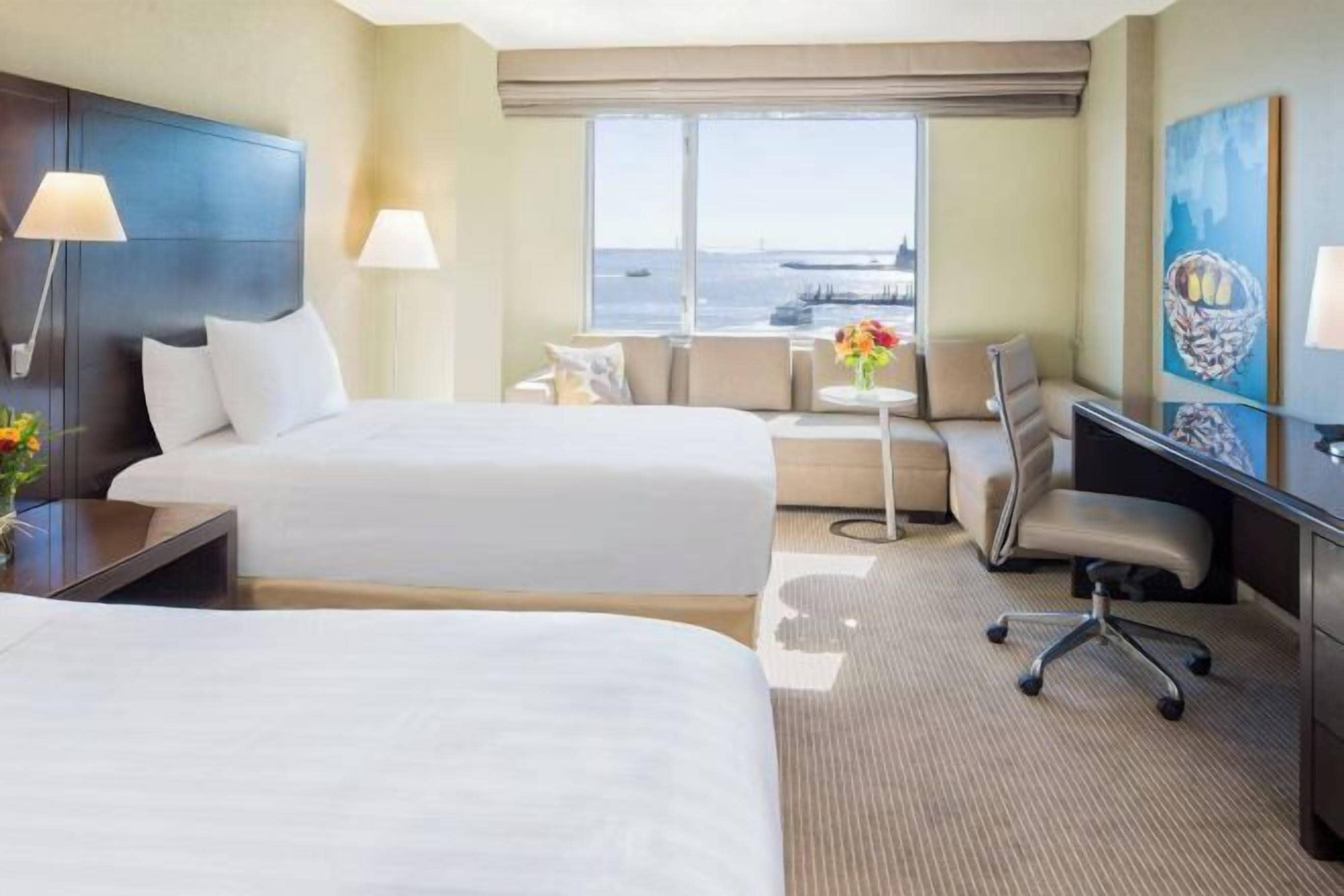 Premium bedding, down comforters, pillowtop beds, in-room safe