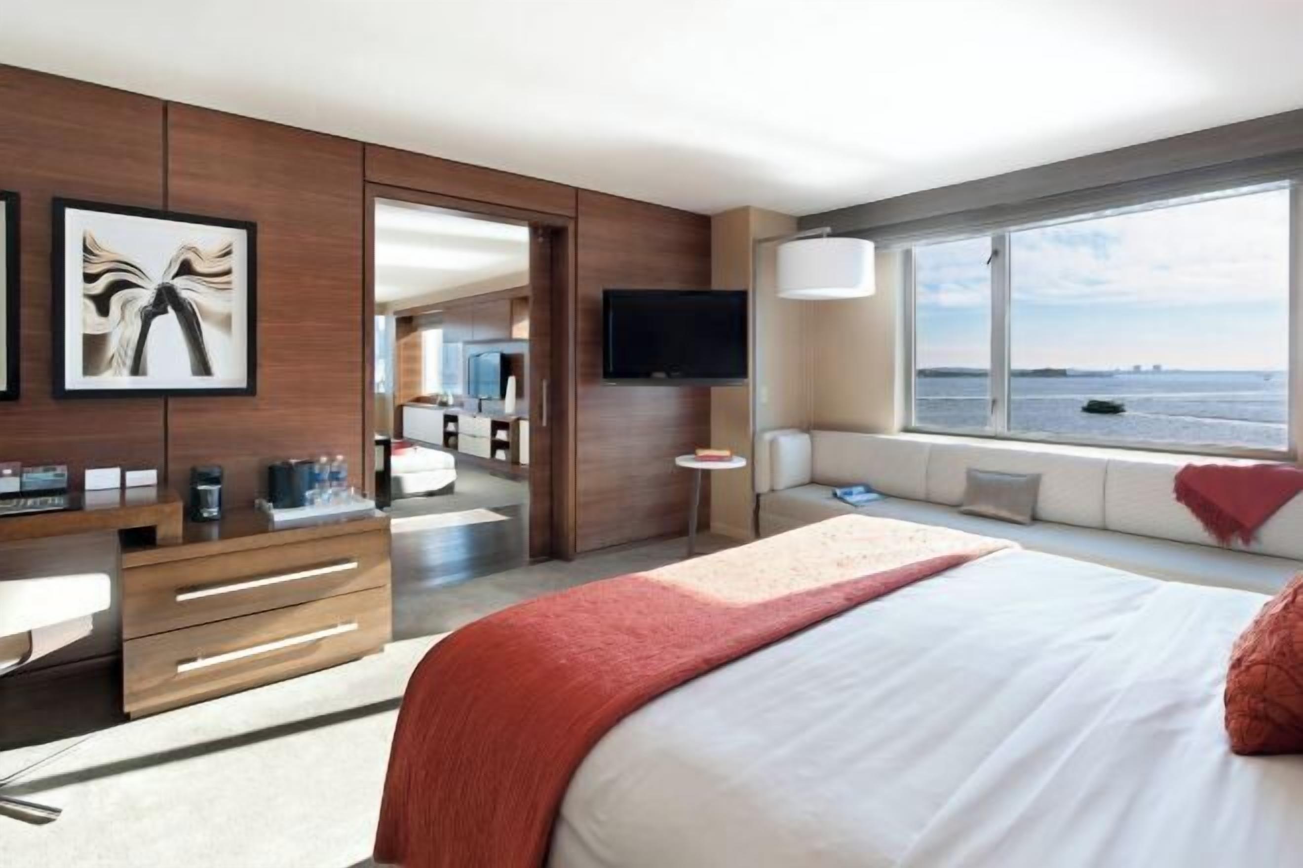 Premium bedding, down comforters, pillowtop beds, in-room safe