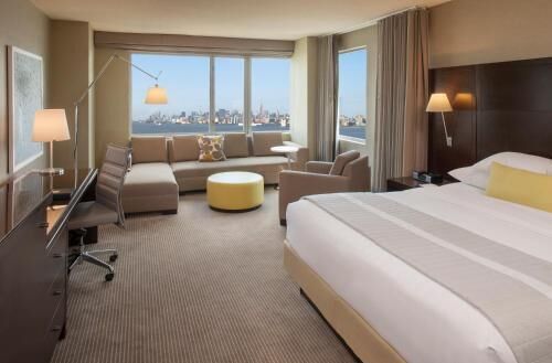 Premium bedding, down comforters, pillowtop beds, in-room safe