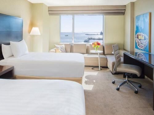 Premium bedding, down comforters, pillowtop beds, in-room safe