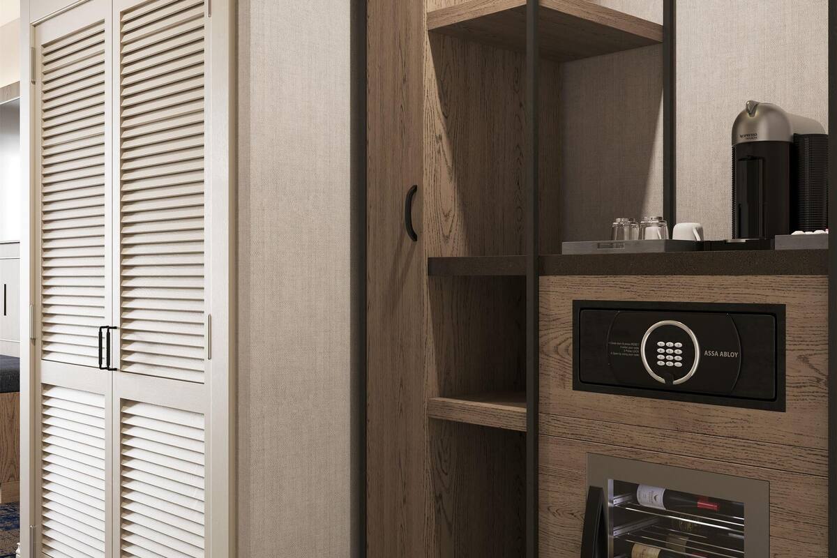 Premium bedding, down duvets, pillow-top beds, in-room safe