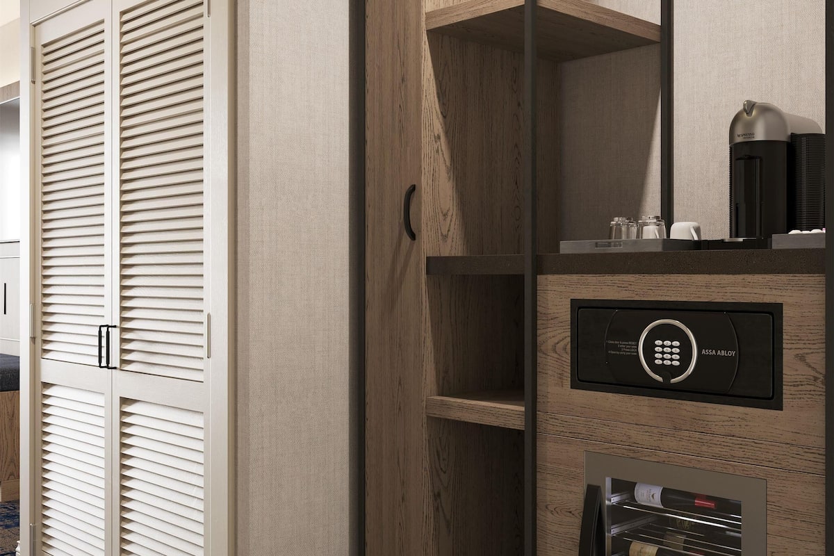 Premium bedding, down comforters, pillowtop beds, in-room safe
