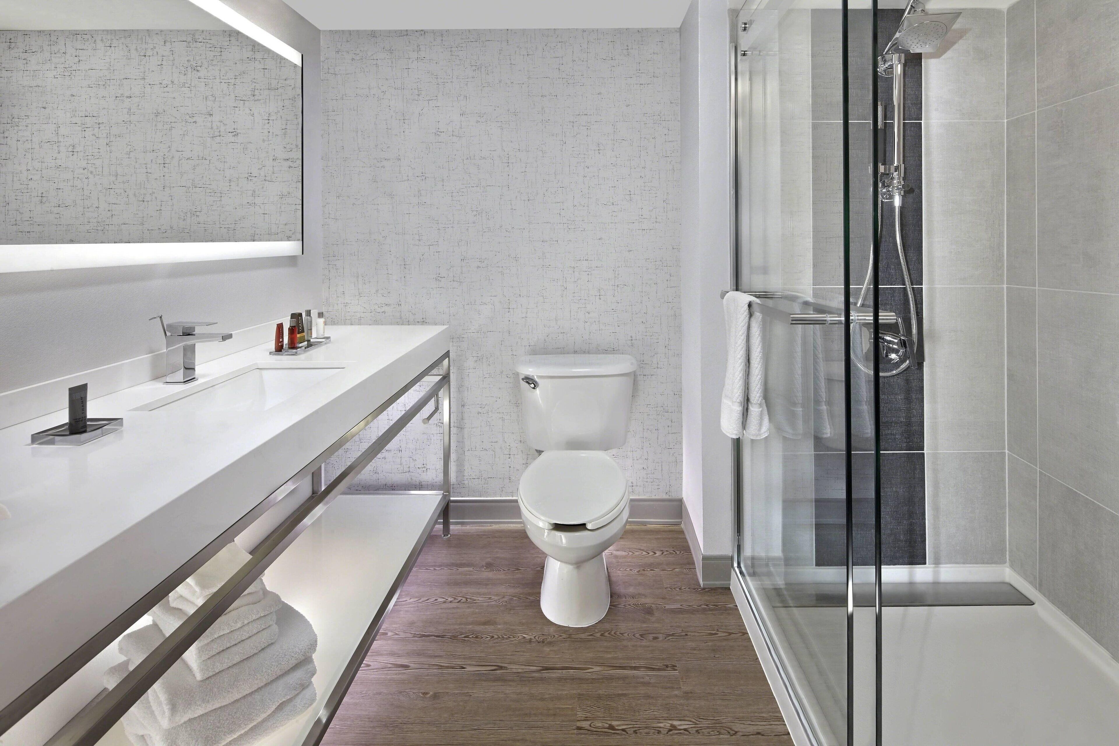 combined shower/bathtub, free toiletries, hair dryer, bathrobes