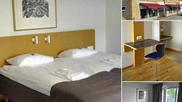 Quarto família, banheiro privativo | Escrivaninha, berços (sobretaxa), camas extras/dobráveis (sobretaxa)