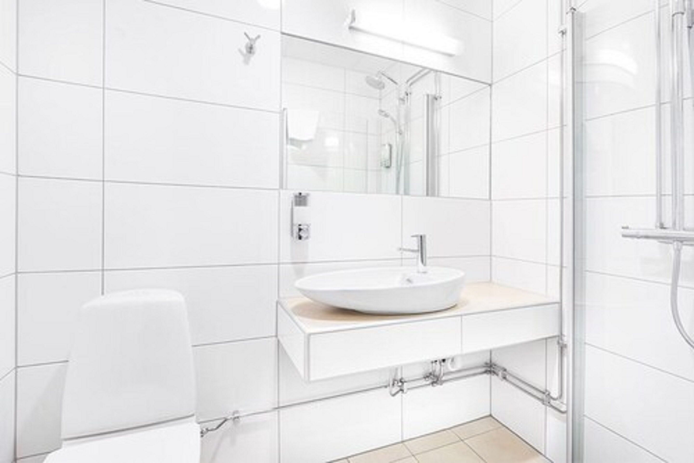 twin room, private bathroom | bathroom | shower, hair dryer, towels