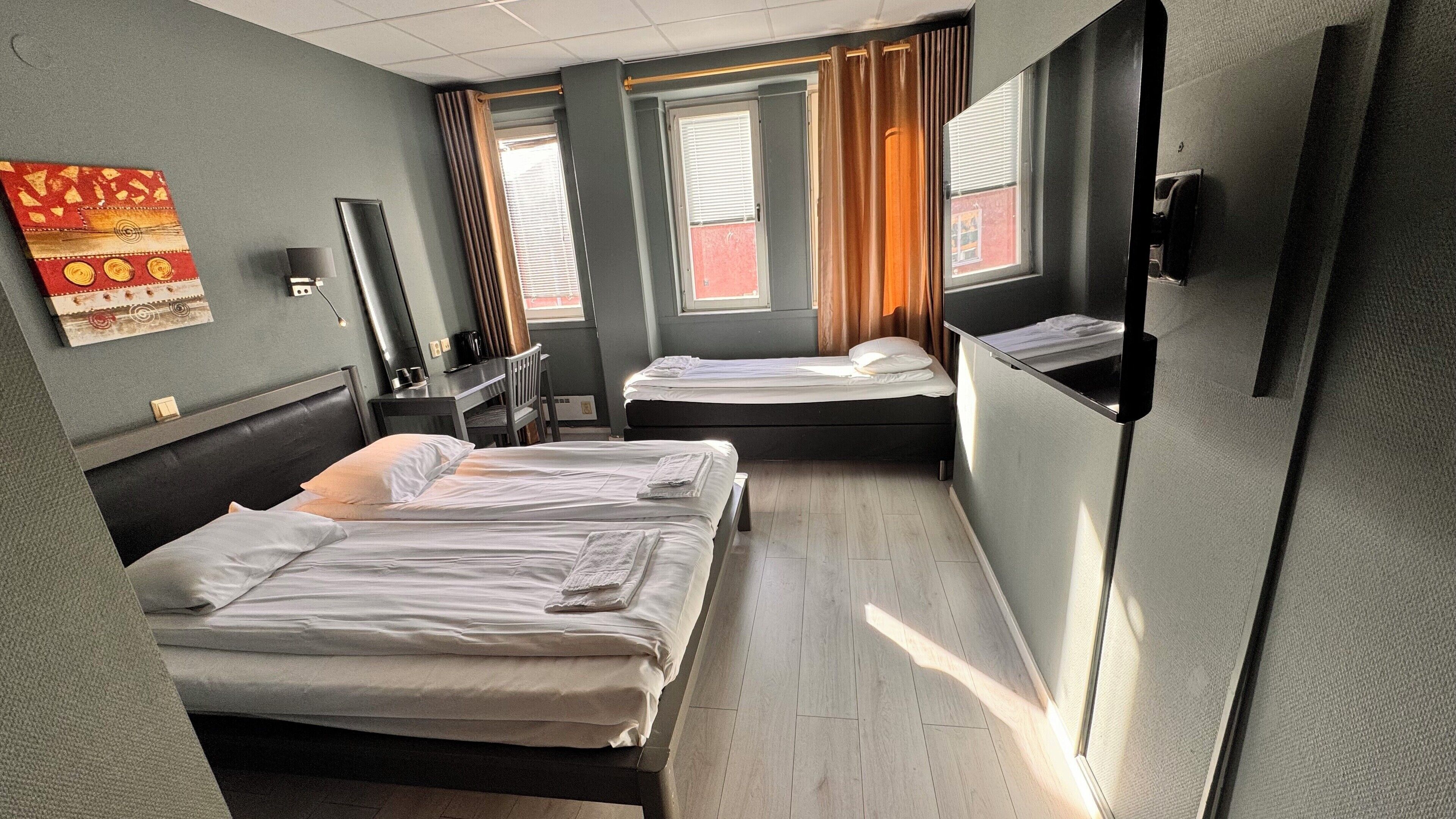 Standard Triple Room | Individually decorated, individually furnished, desk, iron/ironing board