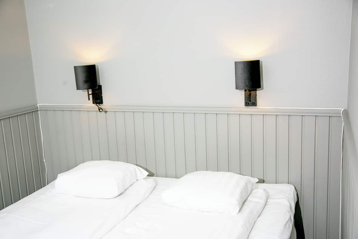 Standard Double or Twin Room, No Windows | Individually decorated, individually furnished, desk, iron/ironing board