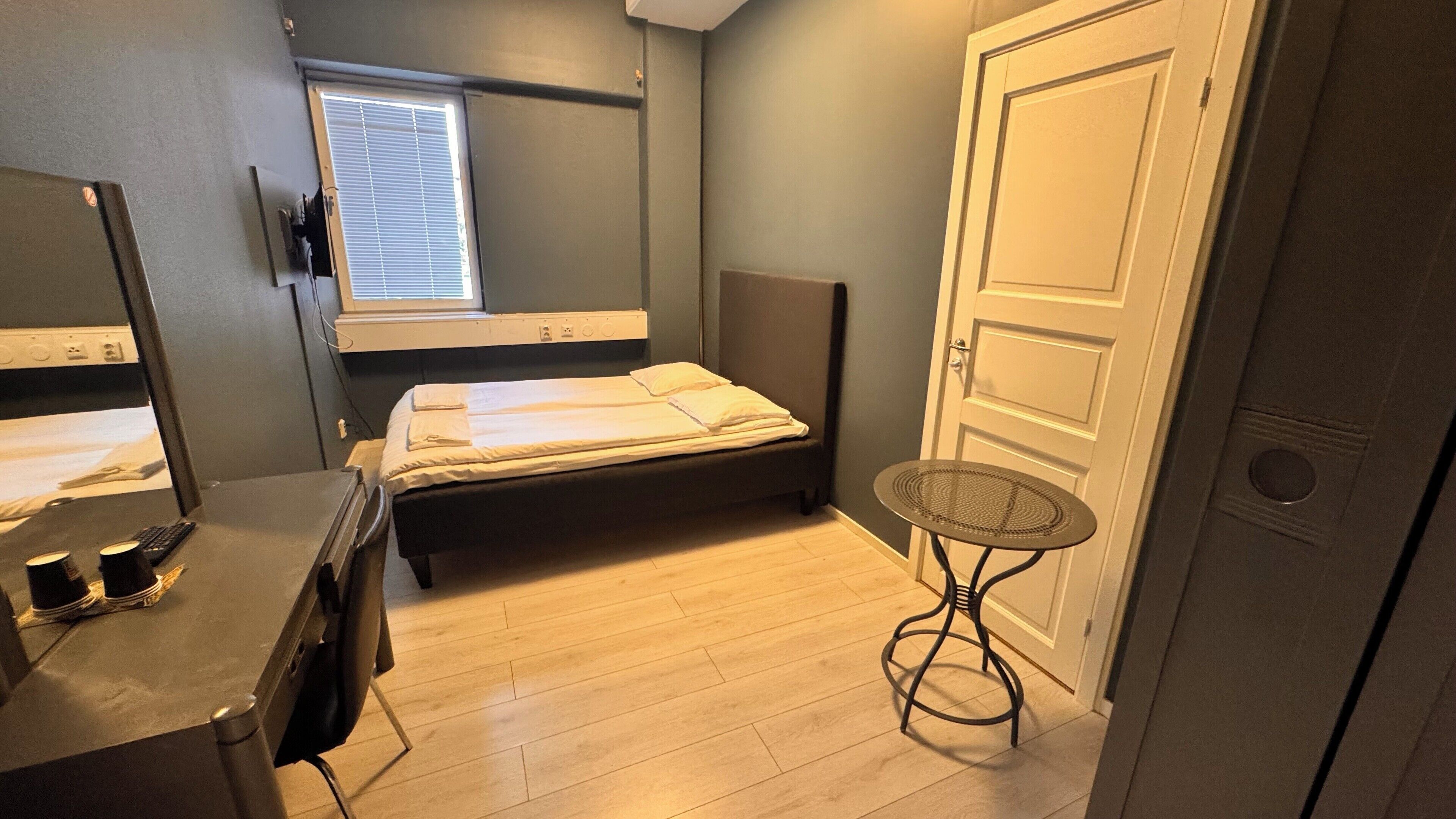 Economy Double Room, Shared Bathroom | Individually decorated, individually furnished, desk, iron/ironing board