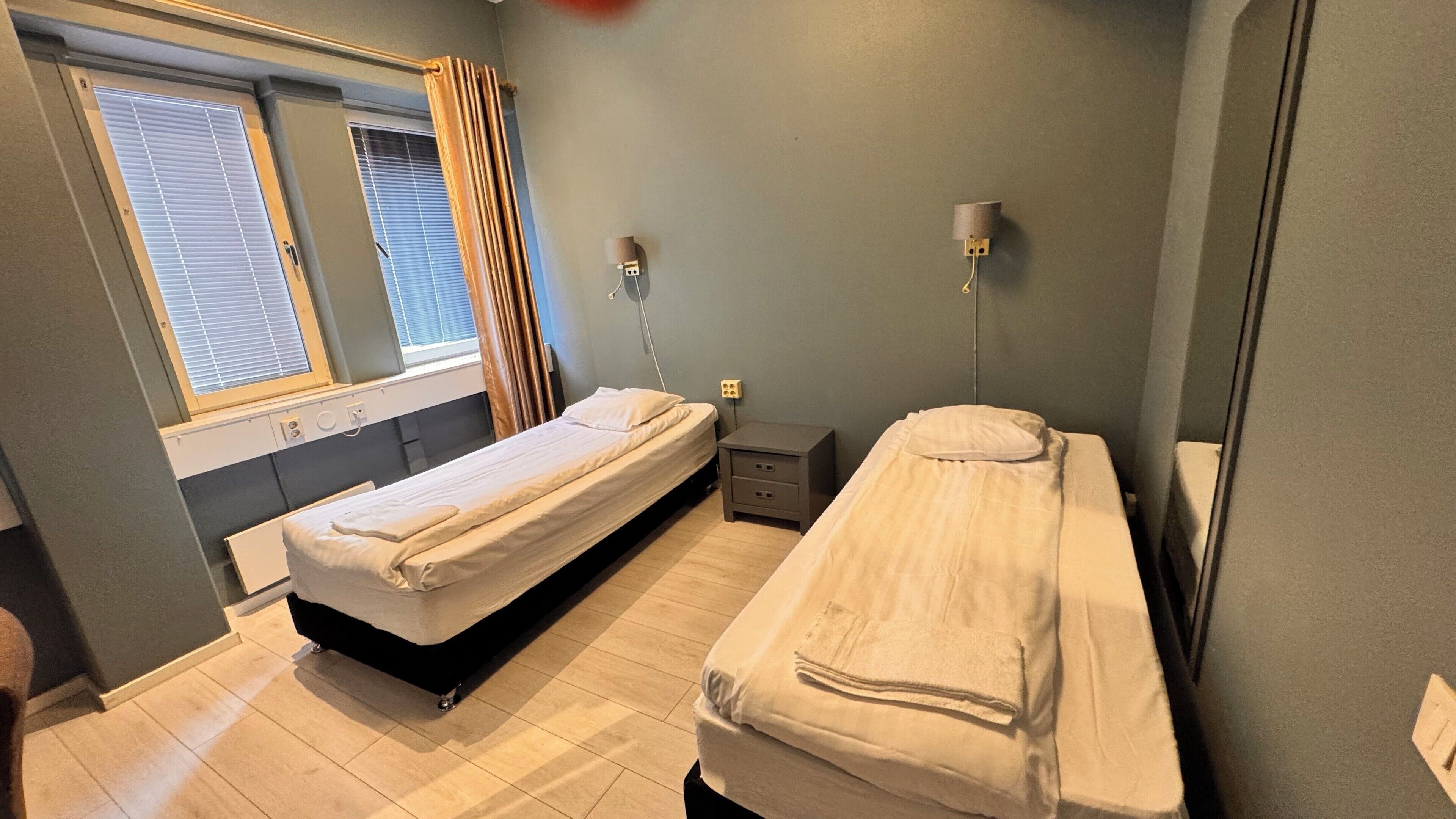 Twin Room with Shared Bathroom | Individually decorated, individually furnished, desk, iron/ironing board