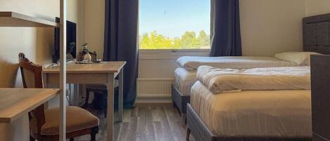 Desk, blackout curtains, iron/ironing board, free cots/infant beds