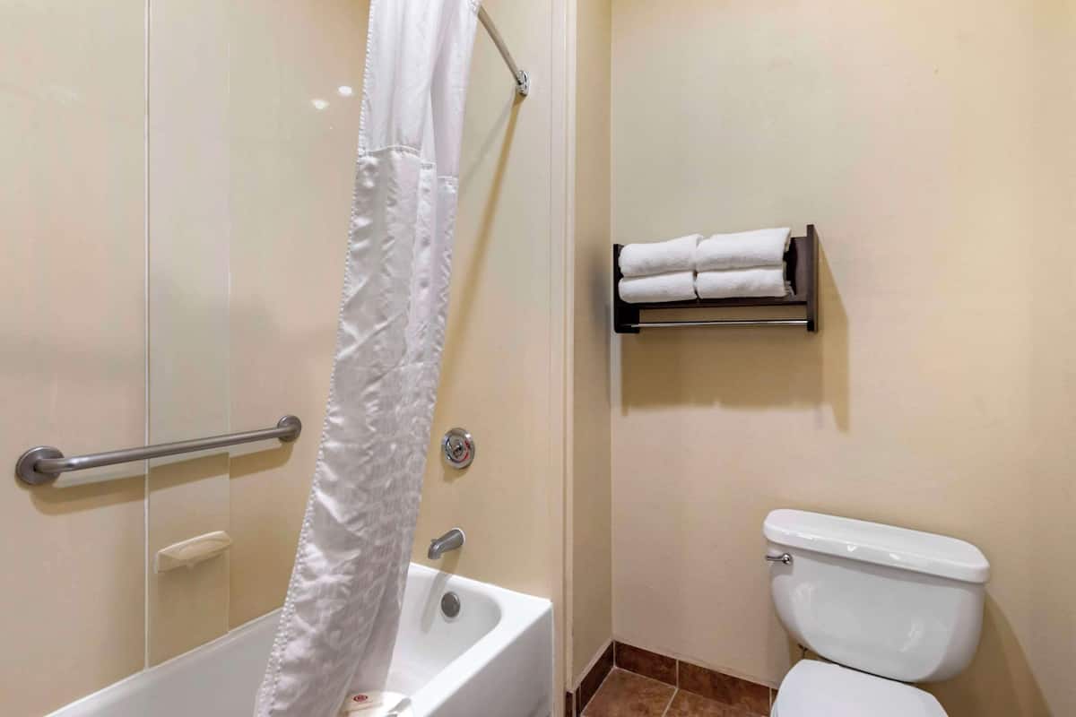 premium bedding, desk, laptop workspace, blackout curtains