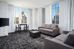 Presidential Suite | Living room | 30-inch TV with cable channels, Netflix, streaming services