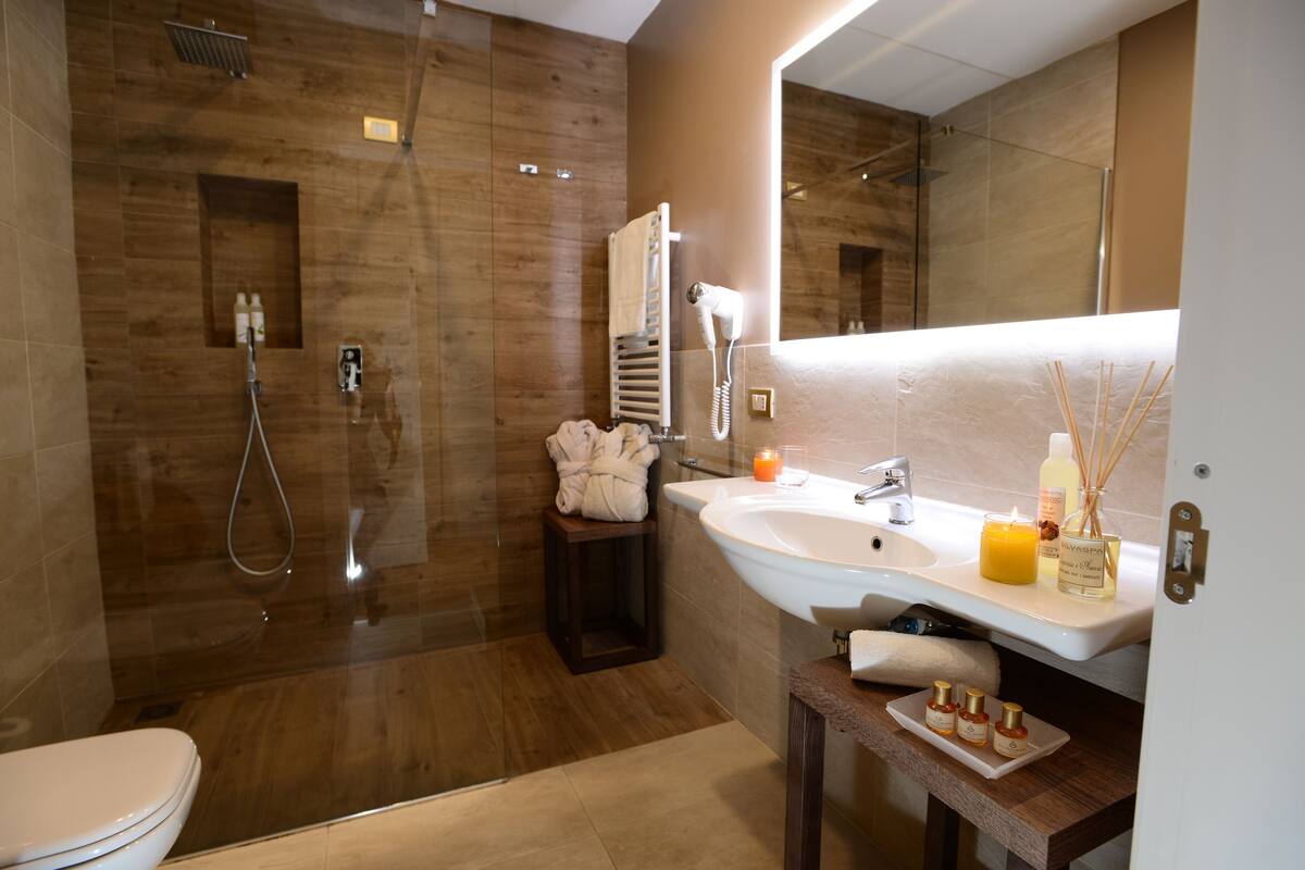 superior double room (free spa access) | bathroom | hair dryer, bathrobes, bidet, towels