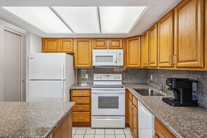 Condo, 1 Bedroom | Private kitchen | Fridge, microwave, oven, stovetop