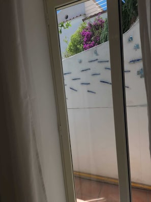 Habitación triple básica | Caja fuerte, wifi gratis, ropa de cama