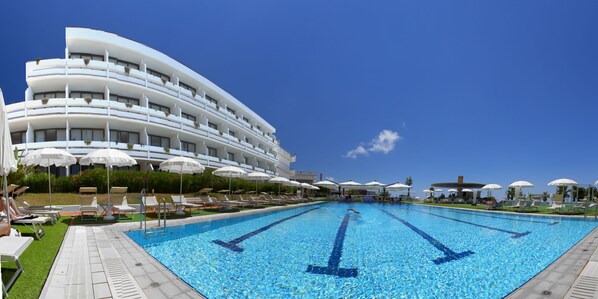 Seasonal outdoor pool, pool umbrellas, pool loungers