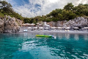 Private beach nearby, black sand, free beach shuttle, beach umbrellas