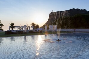 Seasonal outdoor pool, pool umbrellas, sun loungers