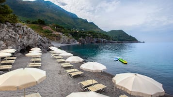 Private beach nearby, black sand, free beach shuttle, beach umbrellas