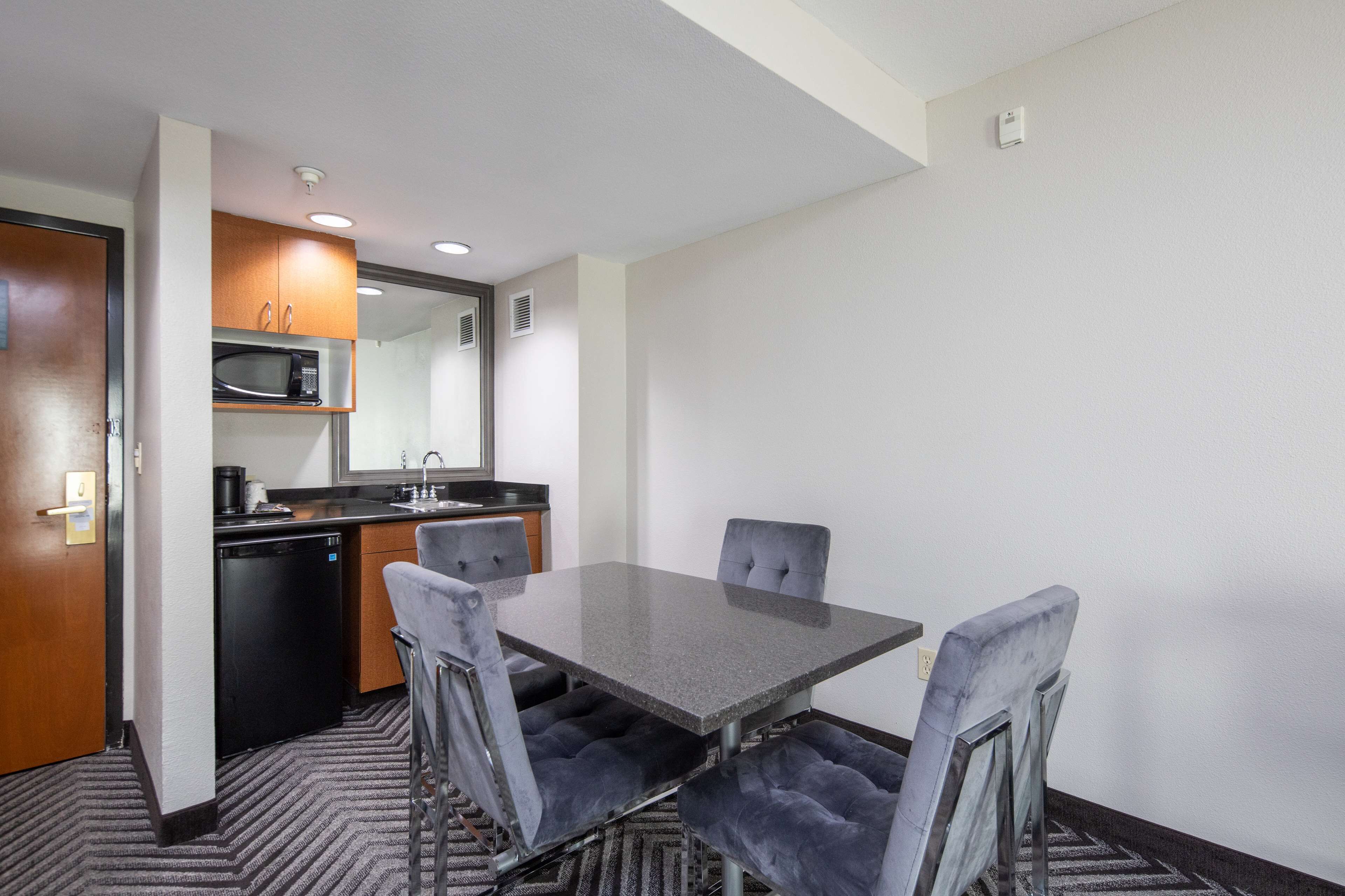 suite, 1 king bed, non smoking, microwave | 1 bedroom, desk, laptop workspace, blackout curtains