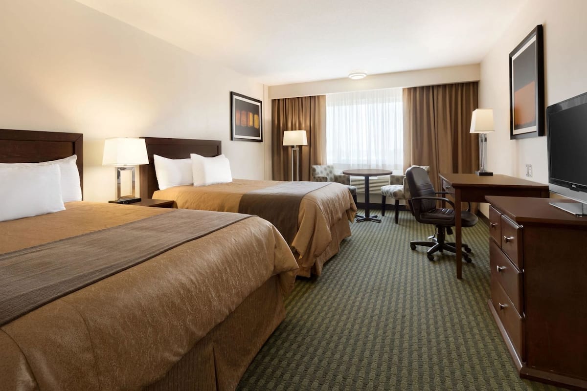 Desk, iron/ironing board, free cribs/infant beds, rollaway beds