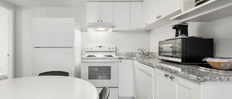 Suite, 2 Queen Beds, Non Smoking, Kitchen (Full Kitchen) | 1 bedroom, laptop workspace, iron/ironing board, cots/infant beds