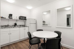 Suite, 2 Queen Beds, Non Smoking, Kitchenette (with Sofabed) | 1 bedroom, laptop workspace, iron/ironing board, cribs/infant beds
