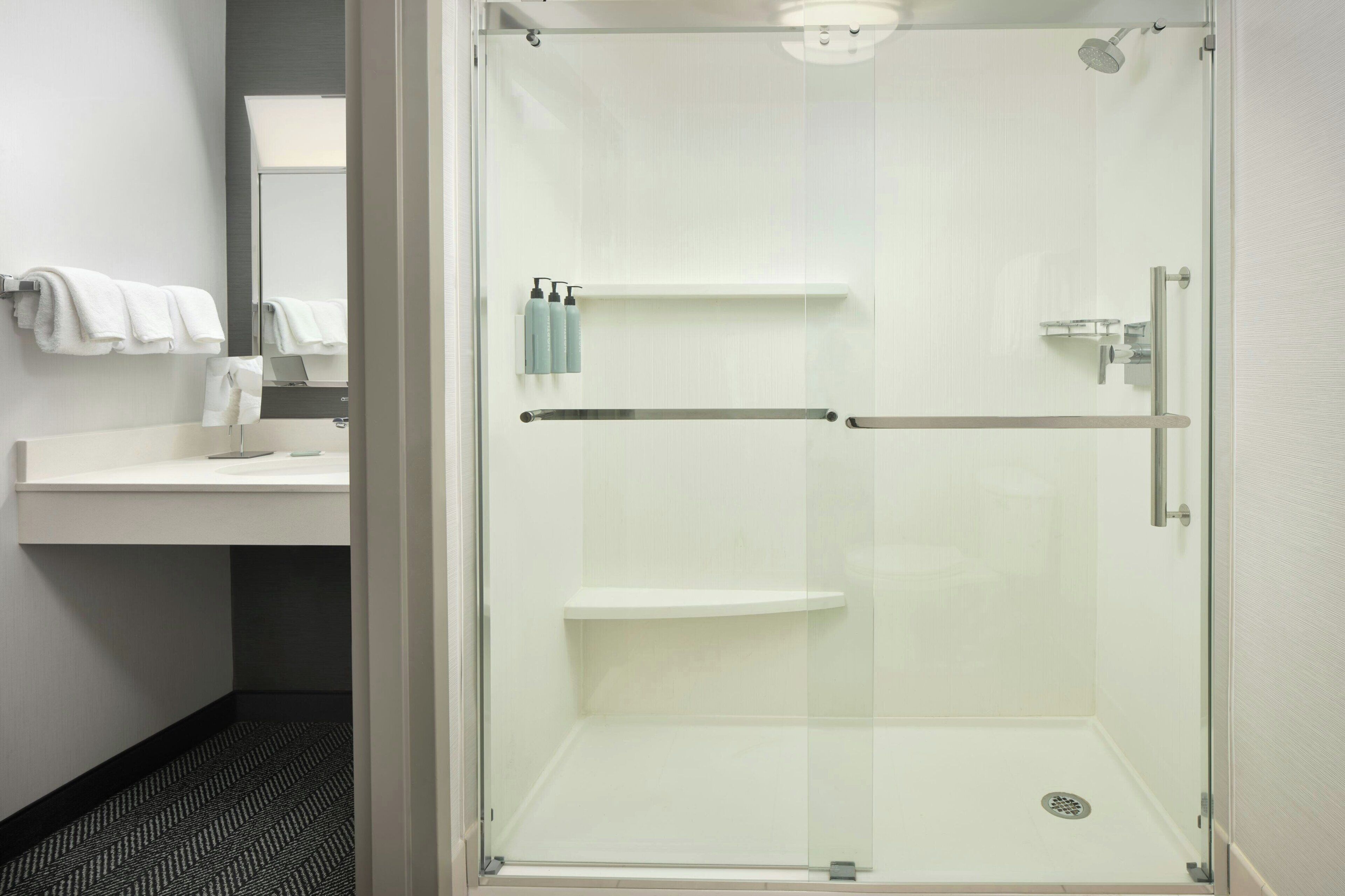 combined shower/bathtub, deep-soaking bathtub, designer toiletries