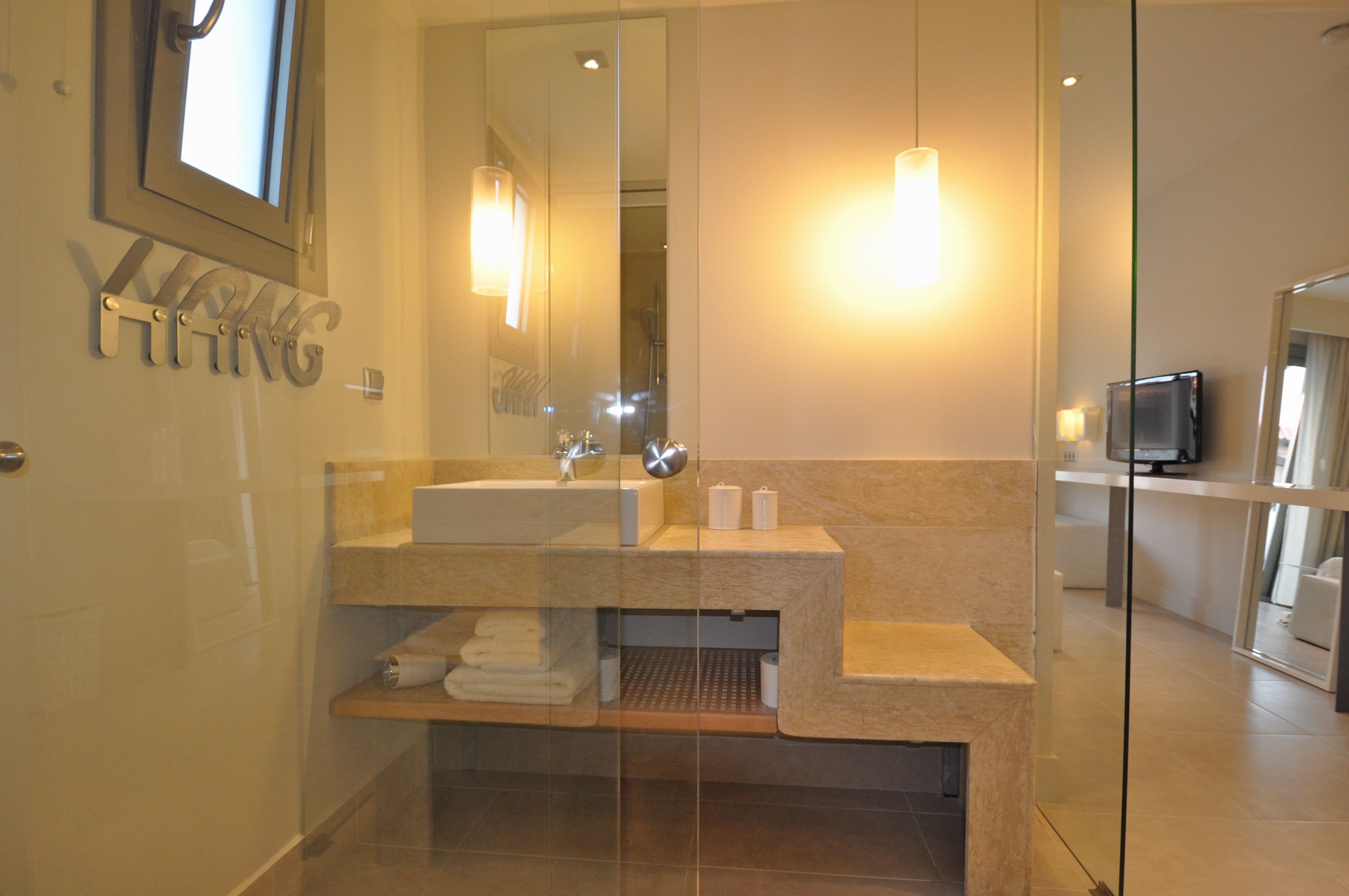 deluxe double room, sea view | bathroom | shower, rainfall showerhead, designer toiletries, hair dryer